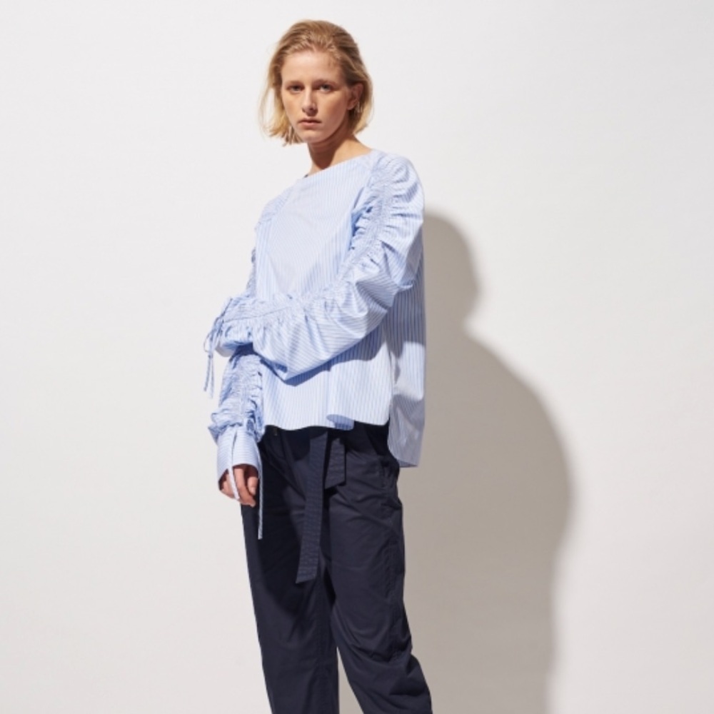 Teija Eilola white shirt with hand-smocked sleeves